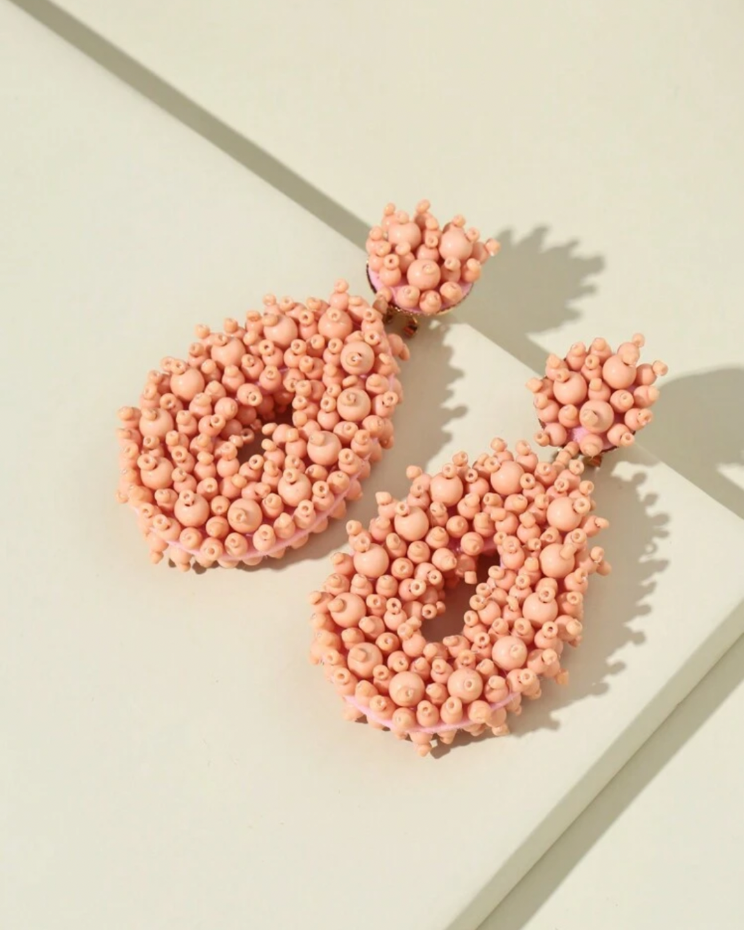 Figure earrings