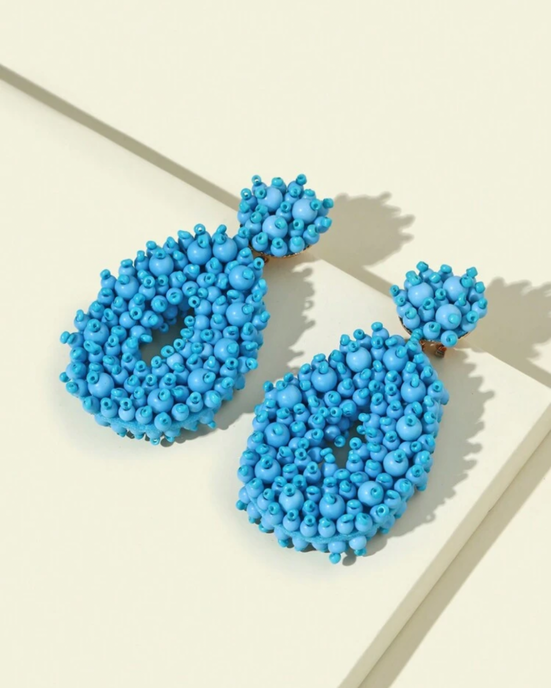 Figure earrings